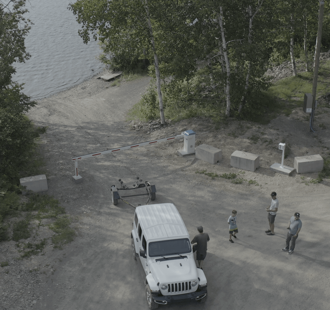 Vehicle at a controlled boat launch