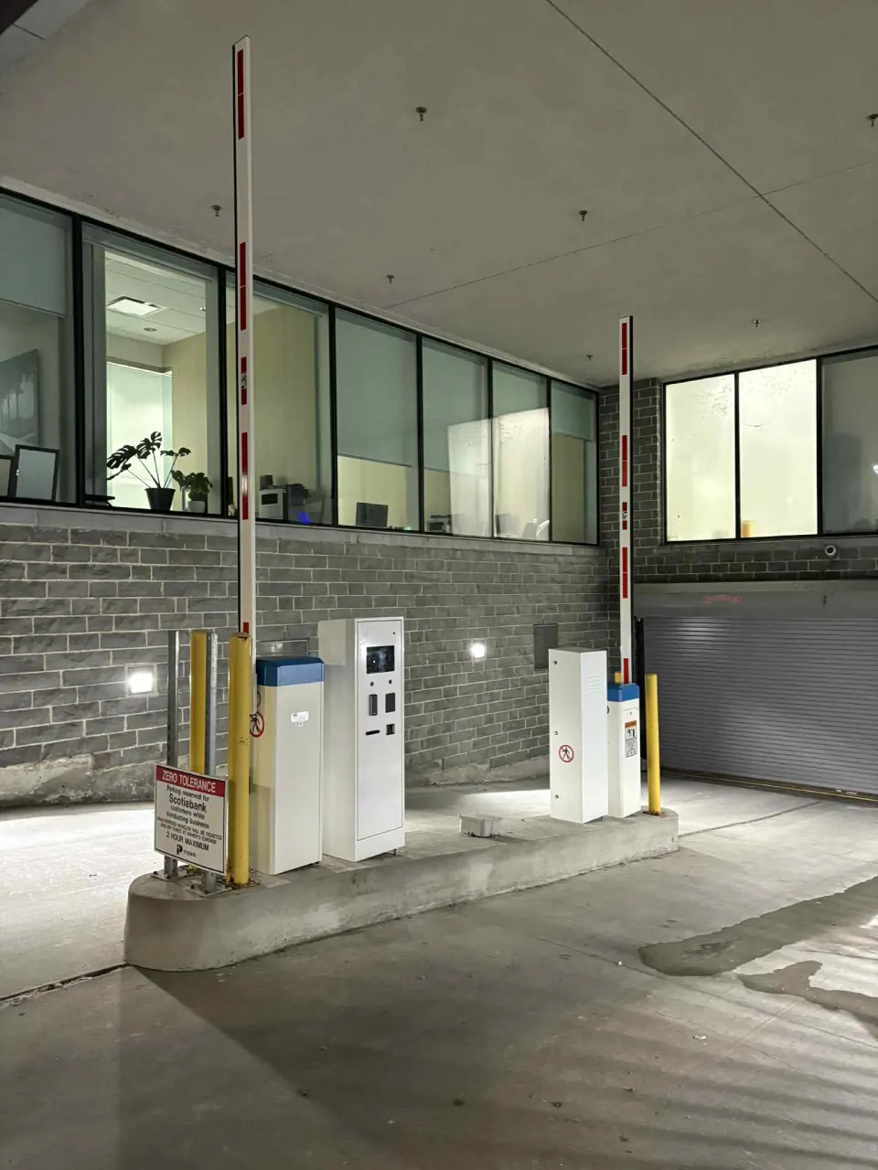 Completed parking lanes with kiosks and automatic barriers at Scotiabank Kingston